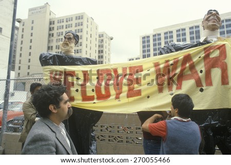 World leader puppets holding sign,  Los Angeles, California