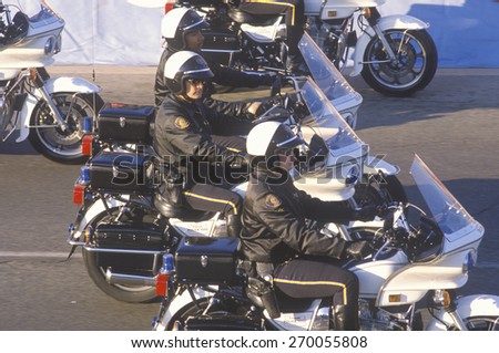 Motorcycle police in formation riding in Rose Parade, Pasadena, California