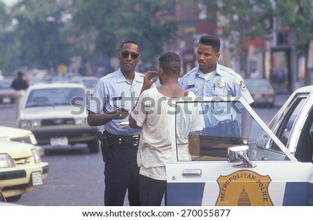Black youth being arrested, Washington, D.C.