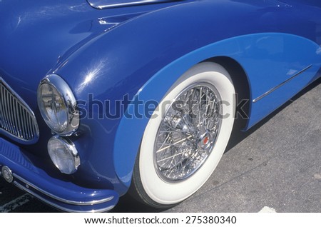 A blue antique car at the Beverly Hills Car Show in Beverly Hills, California