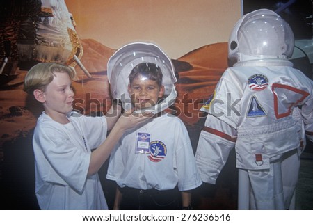 Children try on $1 million spacesuit at Space Camp, George C. Marshall Space Flight Center, Huntsville, AL