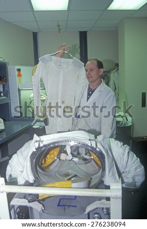 Technician demonstrates $1 million spacesuit at Space Camp, George C. Marshall Space Flight Center, Huntsville, AL