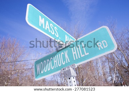 Street sign for Mass. Avenue and Woodchuck Hill Road, Ma., New England, USA