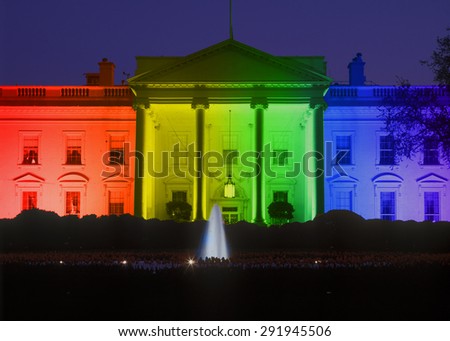 White House in evening, Washington, DC with Rainbow Flag projected onto it, symbolizing screen court decision for the right of LGBT (Lesbians, Gays, Bisexuals and Trans-genders to marry).
