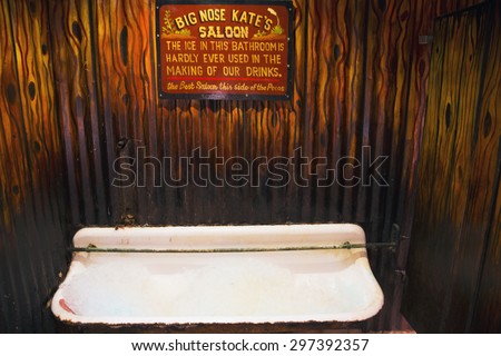Tombstone, Arizona, USA, April 6, 2015, men\'s urinal in old western town home of Doc Holliday and Wyatt Earp and Gunfight at the O.K. Corral