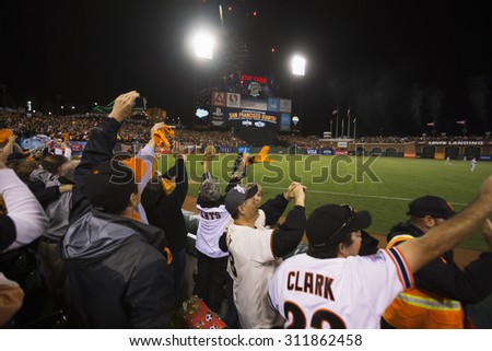 San Francisco, California, USA, October 16, 2014 AT&T Park, baseball stadium, SF Giants versus St. Louis Cardinals, National League Championship Series (NLCS), excited crowd Giants win 2014 NL Pennant