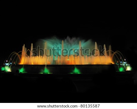 Montjuic magic fountain. A lights,colors and music spectacle at night, displayed in magic fountains situated in Barcelona (Spain)