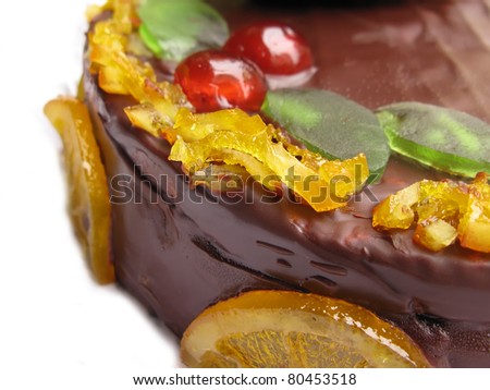 Chocolate and fruits cake, home made for Easter time, a close up detail of fruits