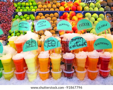 Colorful fruit juices in La Boqueria (Barcelona famous marketplace)