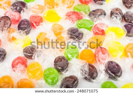 Group of color hard candies on white background