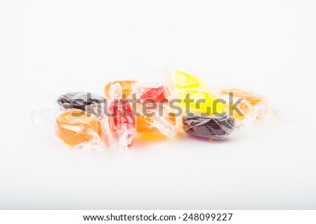 Group of color hard candies on white background