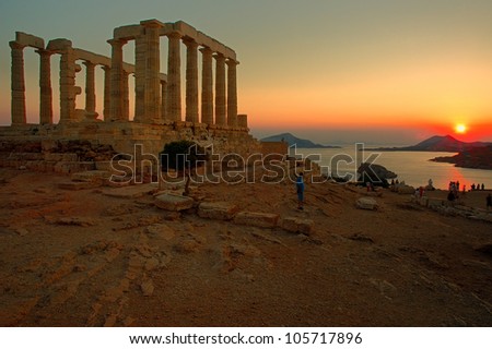 the ancient temple of Poseidon . Cape Sounion , located 69 kilometers of Athens , Greece . The site is a popular day-excursion for tourists from Athens