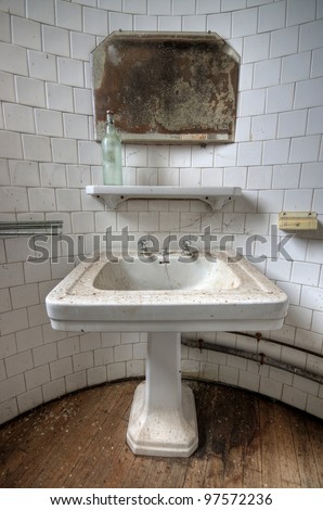 Urban exploration - Dirty bathroom in an abandoned house