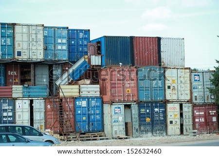 BELARUS, MINSK-August 29, 2013: people work on the stock of the different transport containers.