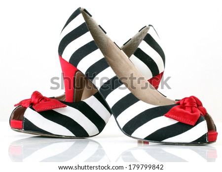 women\'s fashion shoes. zebra pattern. red heel. natural material