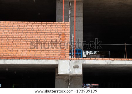 Construction of the wall of the building. Brick masonry cement.