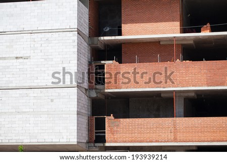 Construction of the wall of the building. Brick masonry cement.