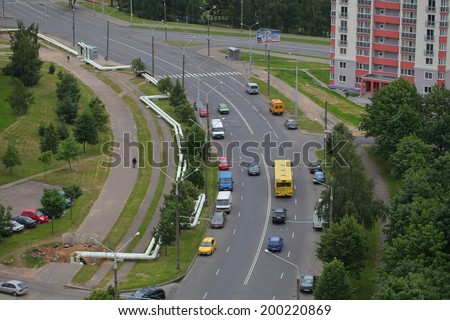 Cars driving down the road, the view from the top. Belarus, Minsk, 20 June 2014