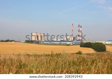 sloping field on a background of city pipes