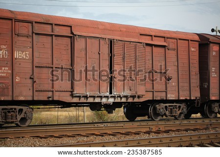 Cargo train platform with container, railway. Belarus, Mogilev, August,28,2014