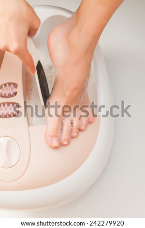 female feet foot spa bath treatment and care