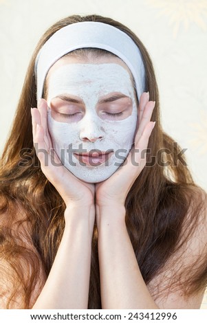 Cosmetic procedure. Cleansing mask on the face of the girl. Power skin.