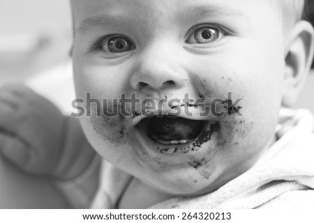 baby mouth smeared with food
