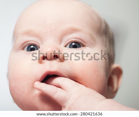 baby boy finger sucking mouth