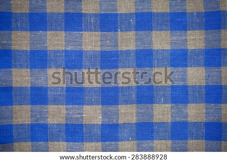 texture of a linen napkin pattern red square