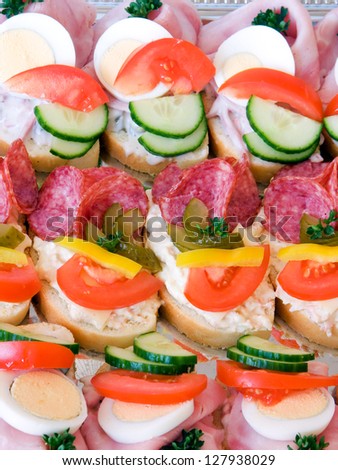 Cold food - salami and fresh vegetables served on plate