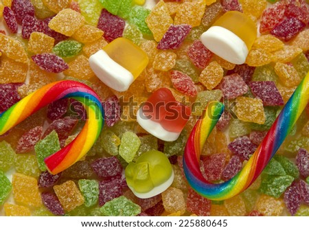 Fruit candies in sugar, marmalade and striped candy closeup