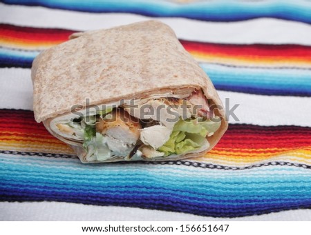 Chicken Wrap / Small Chicken wrap on a sarape cloth. This shot was taken with a Canon Mark II.