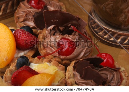 Fruitcake / Fruit mini cakes filled with chocolate moose and fruit.