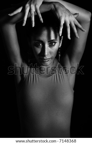 Artistic portrait of young dancer woman in black and white