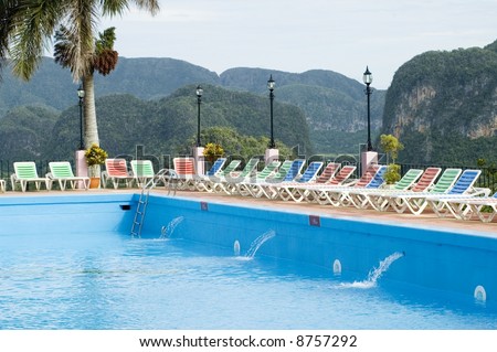 Tropical resort - Hotel Pool by on tropical landscape (Pinar del Rio, Cuba)