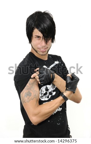 stock photo Portrait of fashionable young man showing his arm tattoo