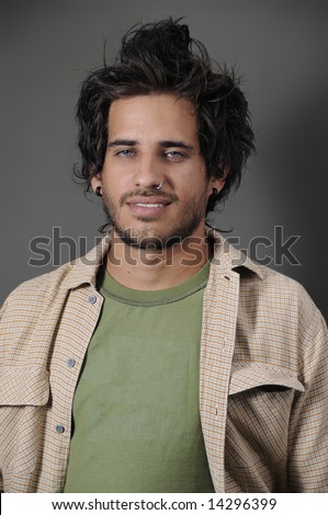 stock photo : Portrait of young handsome male with nose piercing