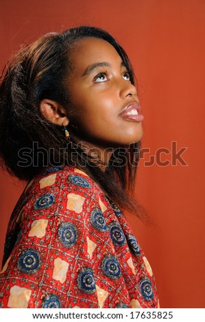 Portrait of young african female model posing