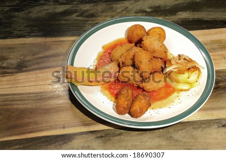 Cuban typical food served over wooden background