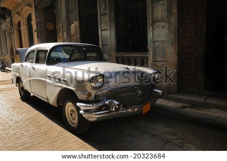stock photo Vintage classic american car in the streets of Old havana