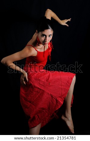 Portrait of hispanic flamenco dancer woman isolated on black