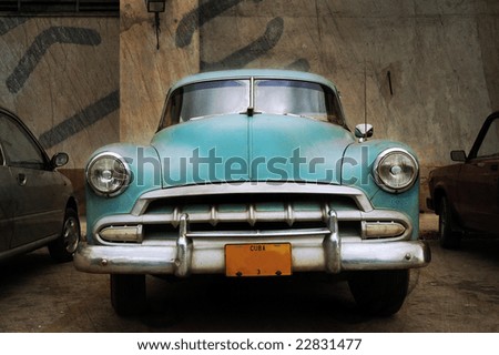 stock photo Front view of vintage classic american car over grunge 