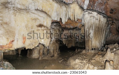 Detail of cave interior with rocks and crystal formations