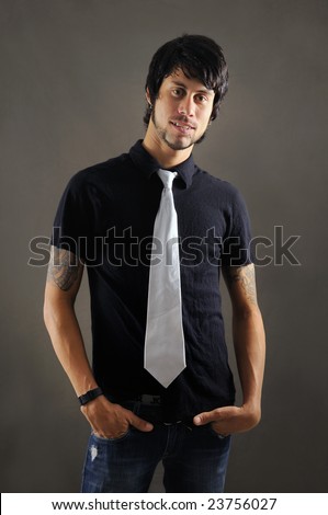 stock photo : Portrait of young trendy business man with tattoo