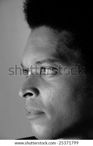 Profile portrait of young african american man in black and white