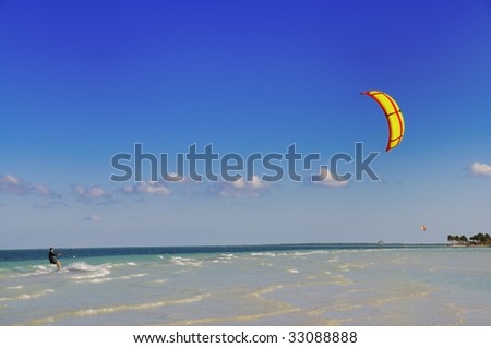 Portrait of man practicing water sports - windsurfing