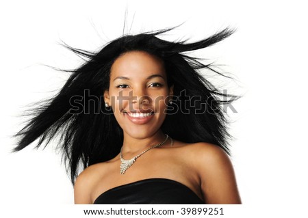 Portrait of young beautiful african american woman with long hair and happy expression