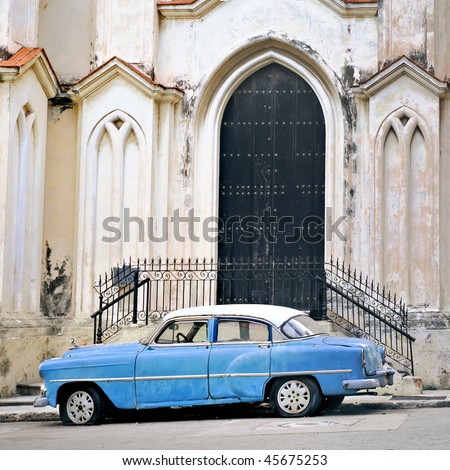stock photo A view of classic american old car parked in front of Havana
