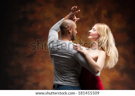 Young couple dances Caribbean Salsa