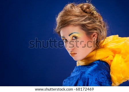 Woman in blue on blue background